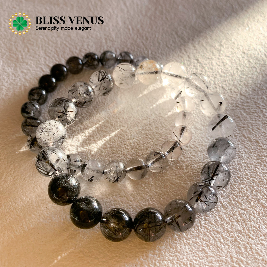 Black hair crystal protection bracelet detail view displaying natural hair-like patterns