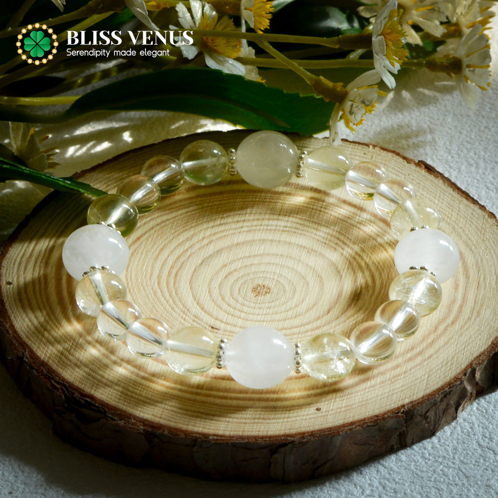 Clear crystal and yellow crystal bracelet detail view displaying bead size variation and color blend