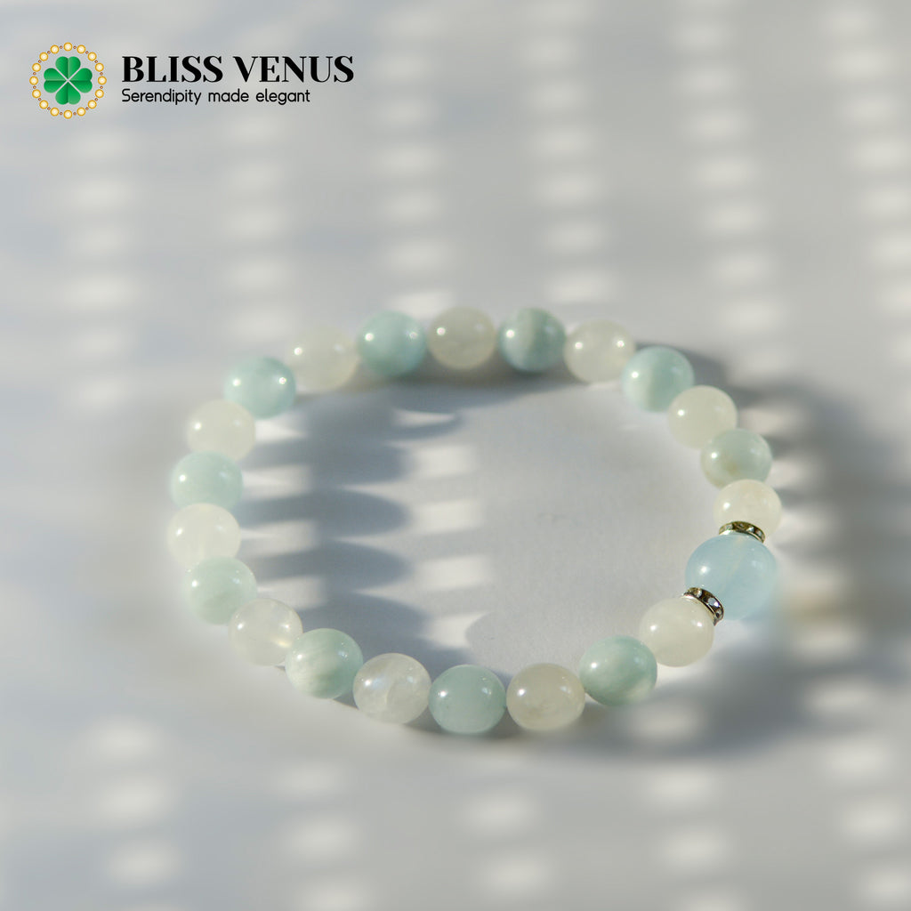 Close-up of aquamarine and moonstone bracelet showing natural blue and white gemstone colors and clarity