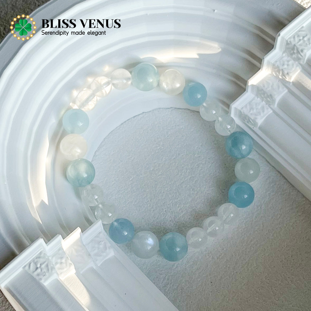 Close-up of moonstone aquamarine and clear crystal bracelet showing natural blue and white gemstone colors