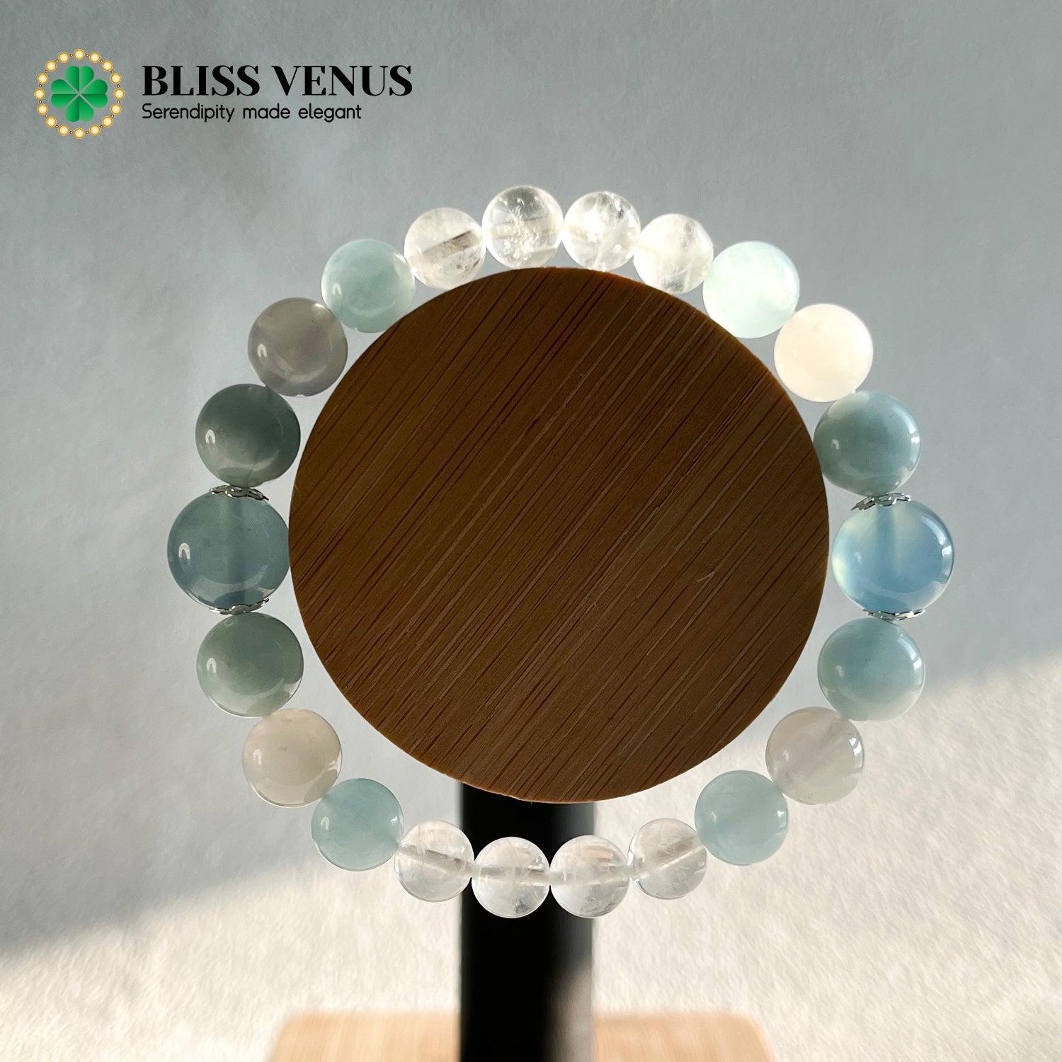 Close-up of moonstone aquamarine and clear crystal bracelet showing natural blue white gemstone colors and luster