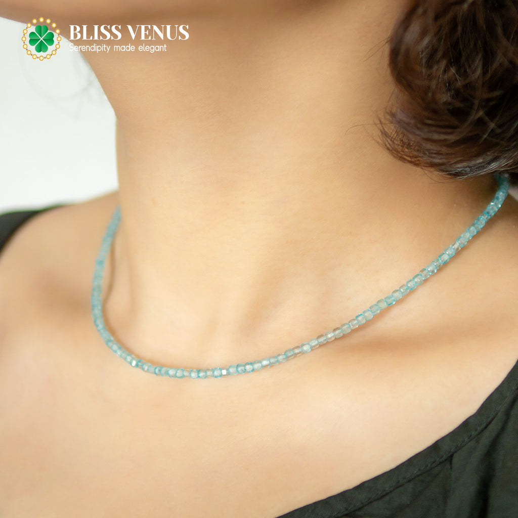 Close-up of tourmaline beaded necklace showing natural blue gemstone color and delicate beading