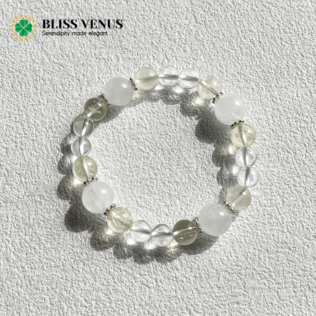 Close-up of white and yellow crystal bracelet showing natural gemstone clarity and golden citrine hues