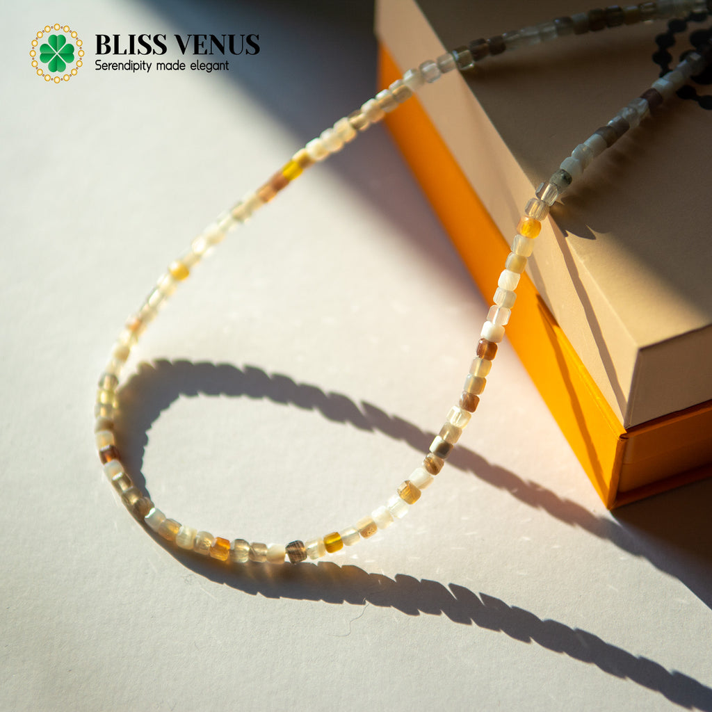 Full view of Persian Gulf agate beaded necklace with natural color variations