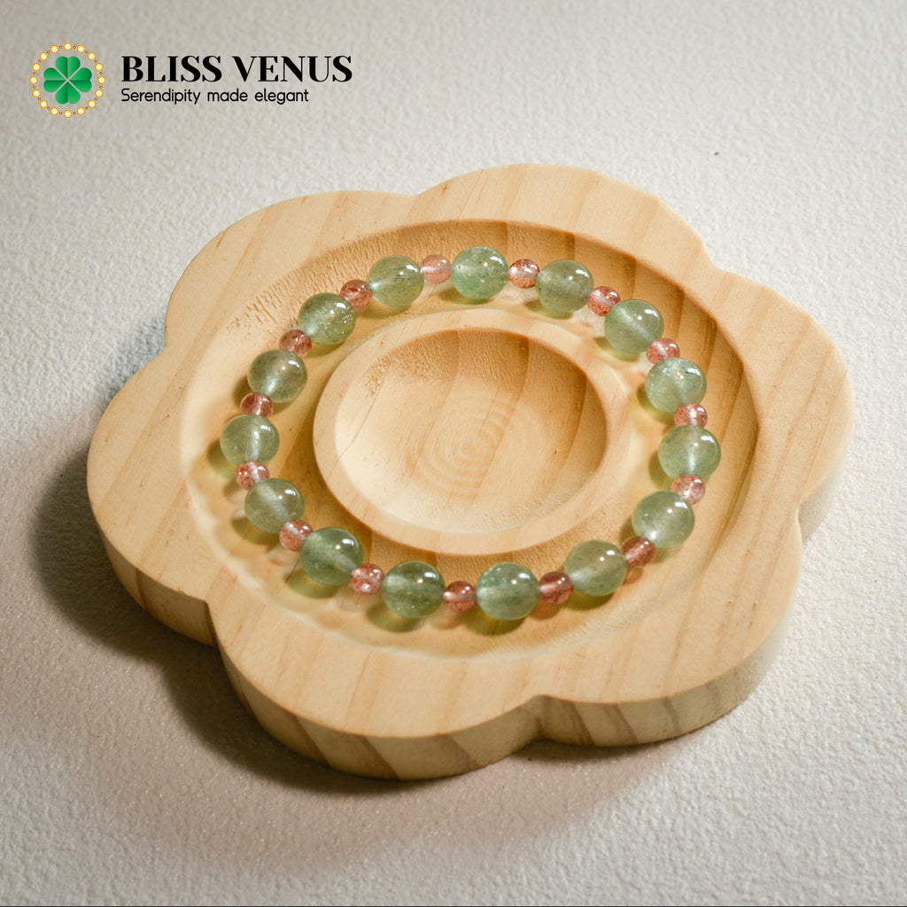 Full view of red and green strawberry crystal bracelet, attraction and stability complementary effect