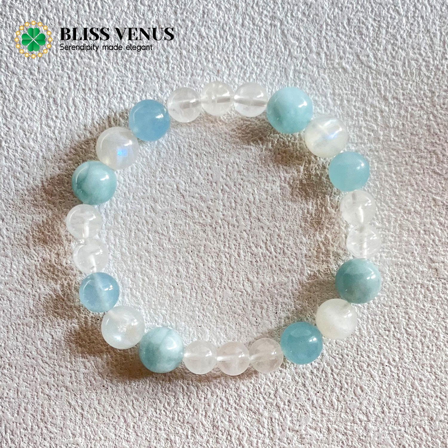 Natural moonstone aquamarine clear crystal beaded bracelet worn on wrist, March and June birthstones