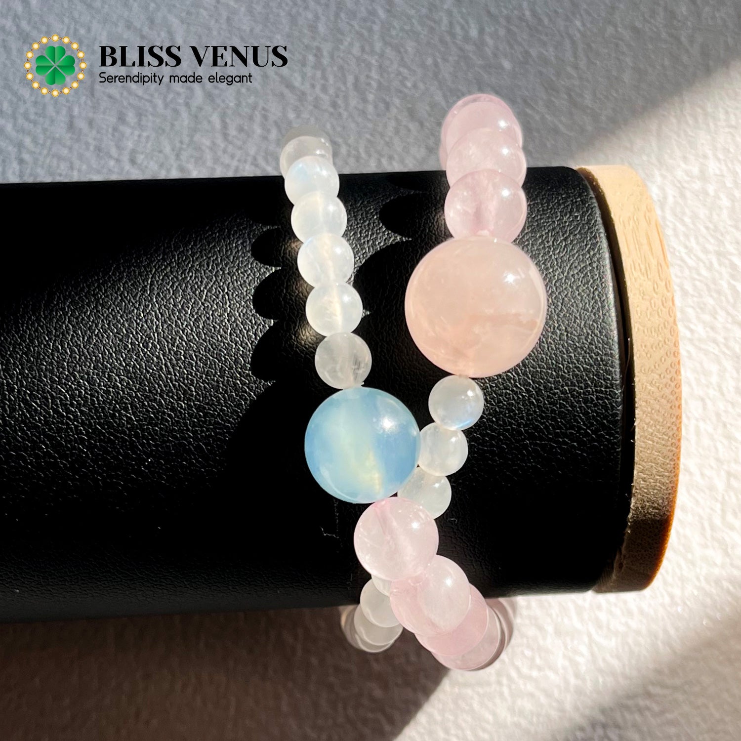 Natural pink crystal moonstone aquamarine beaded bracelet worn on wrist, double strand design