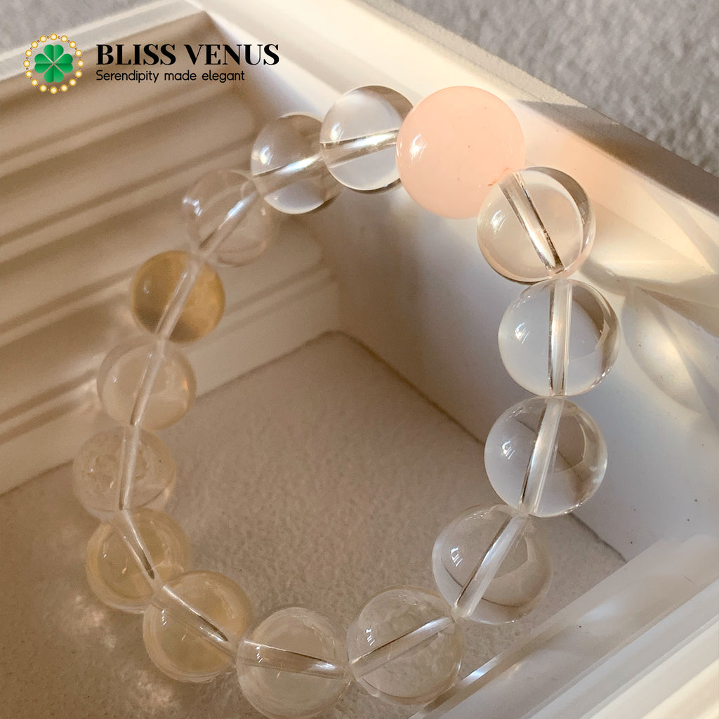 Natural white and pink crystal beaded bracelet worn on wrist, love and harmony energy stones