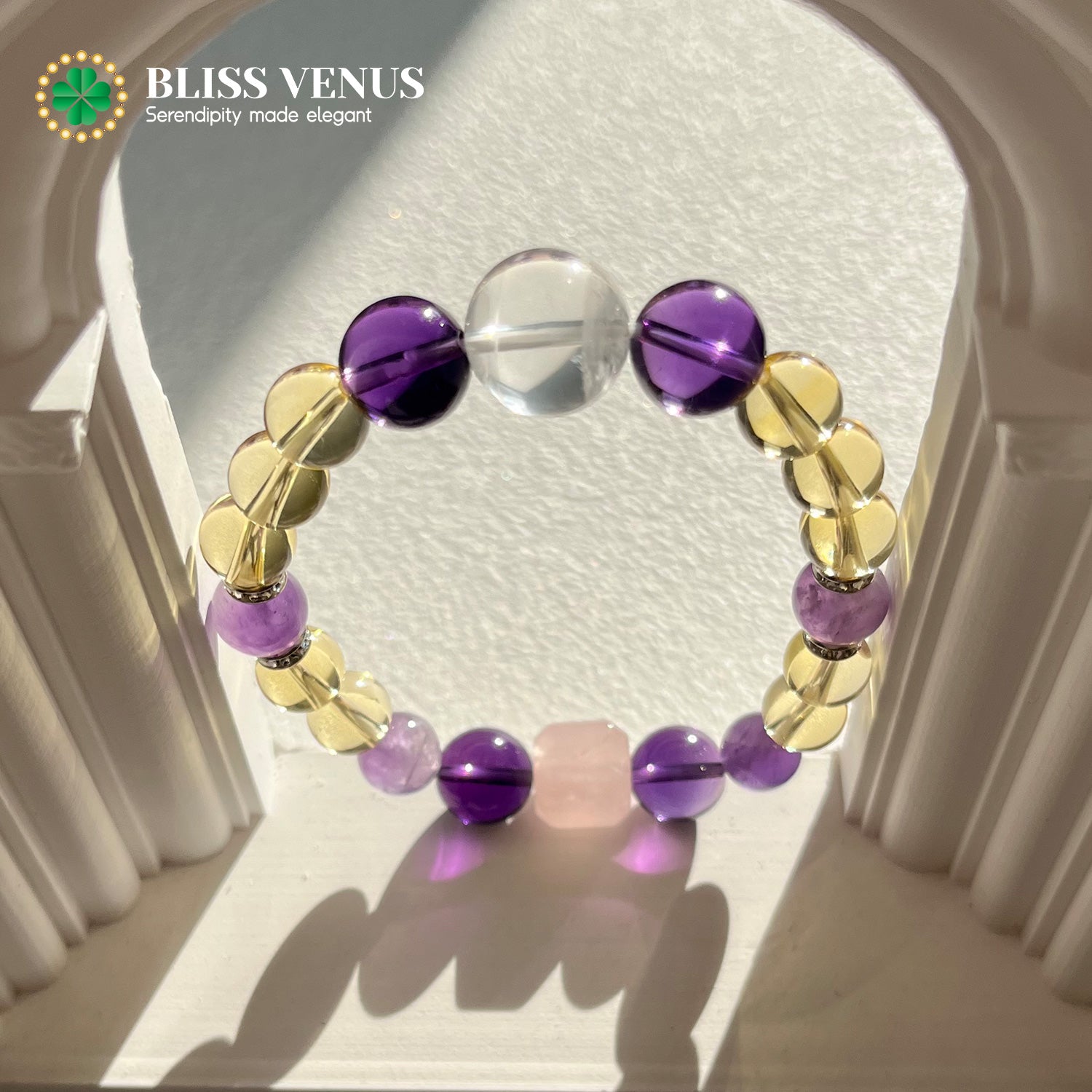 Natural yellow white purple pink crystal beaded bracelet worn on wrist, five elements harmony design