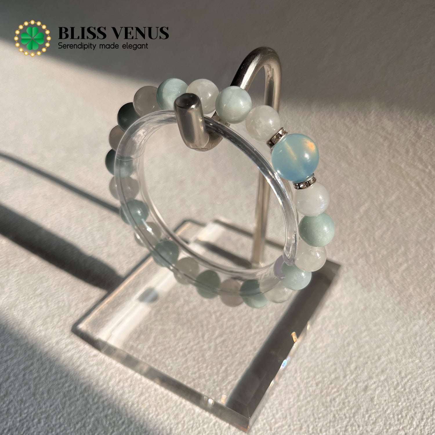 Side angle of aquamarine moonstone bracelet showing composure calmness and romantic harmony
