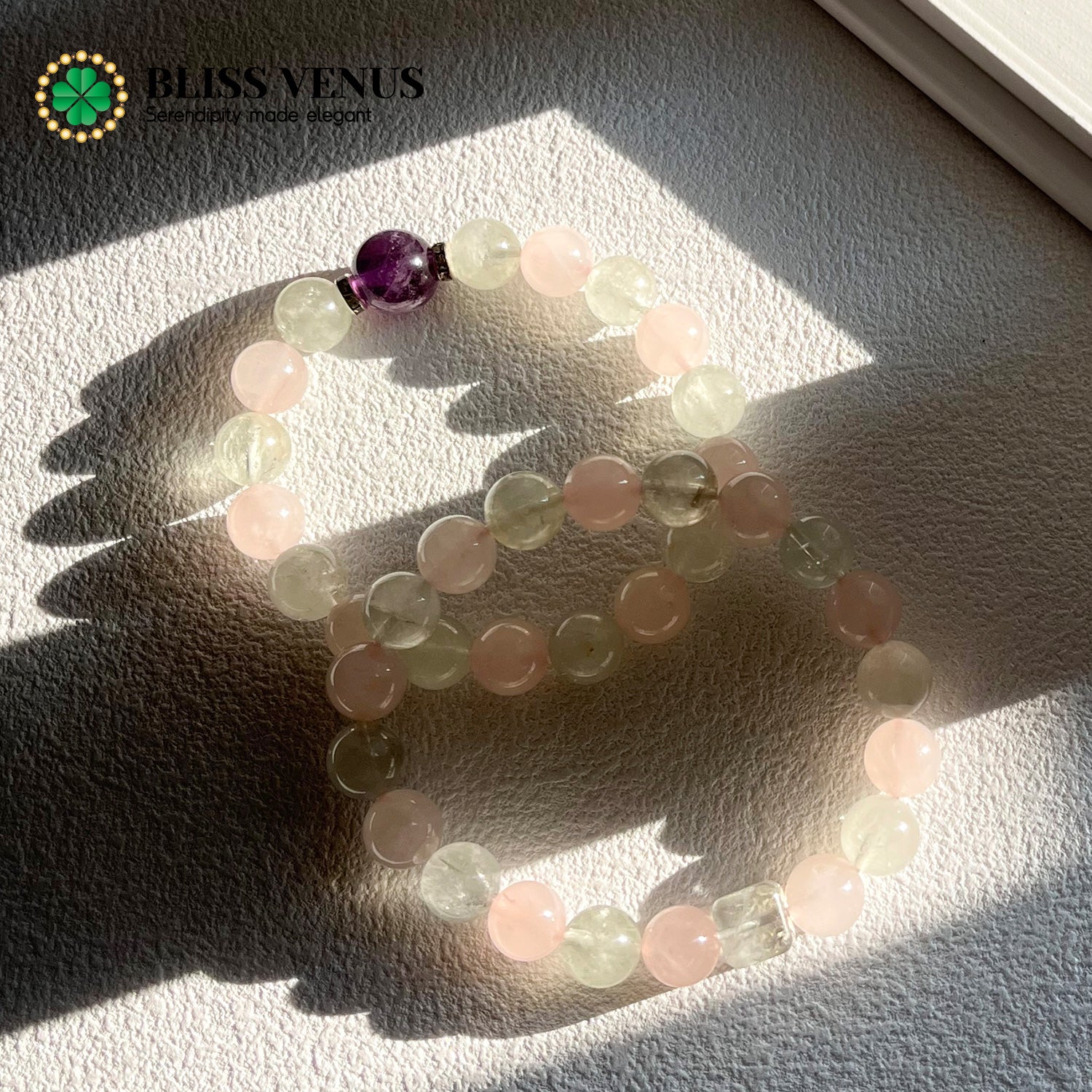 Side angle of pink and green crystal bracelet showing complementary gentle and vibrant energies