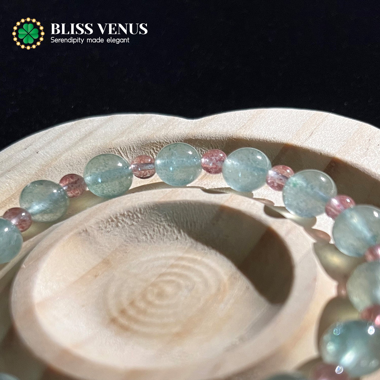 Strawberry crystal bracelet worn on wrist, heart chakra stone for love and emotional balance